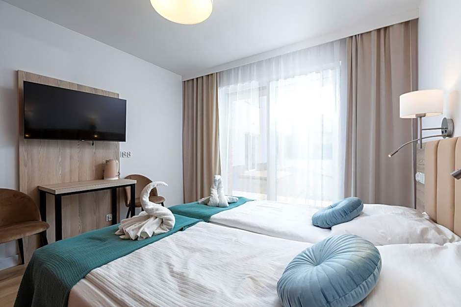 APARTAMENTY przy plaży z basenem z podgrzewaną wodą i mini SPA - Ośrodek Kolonijno-Wczasowy Mewa