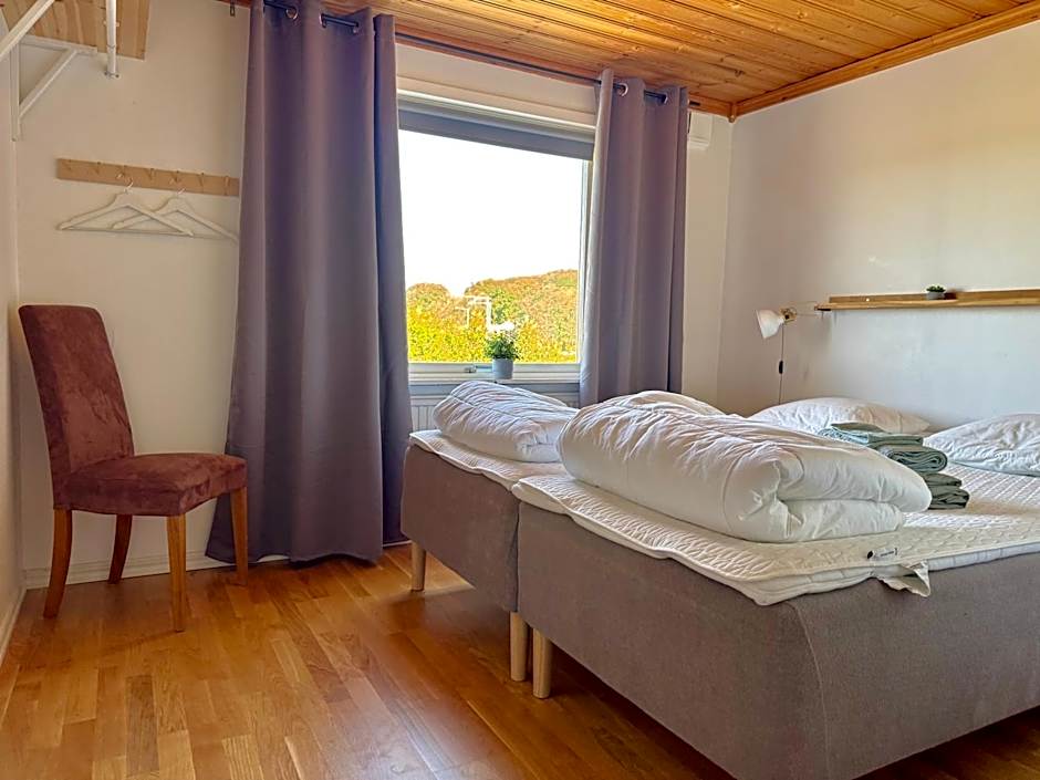 Comfortable guest rooms with fully equipped kitchen and cosy living room.