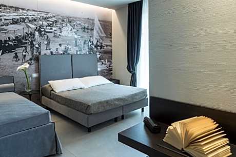 Superior Triple Room with Side Sea View