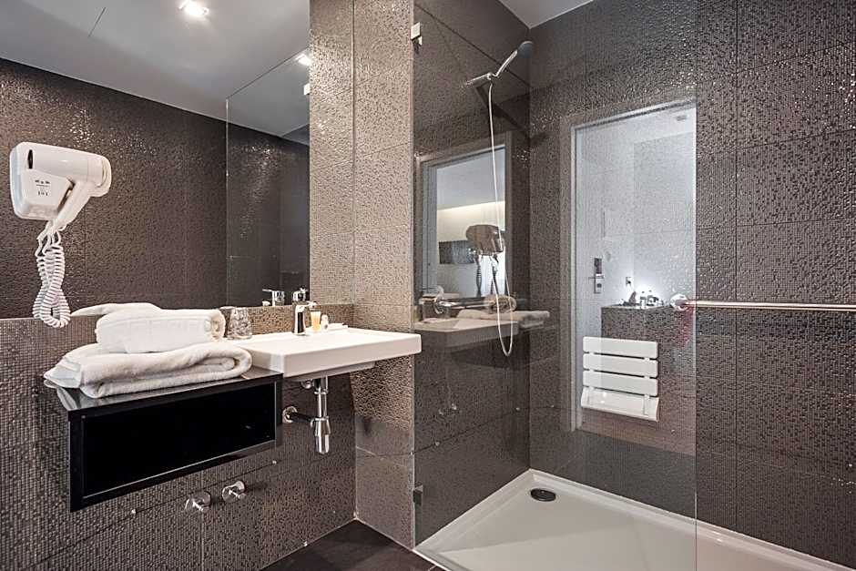 Essence Inn Marianos Hotel