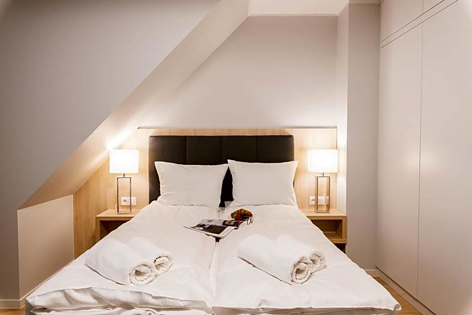 Q17 Apartments Rynek