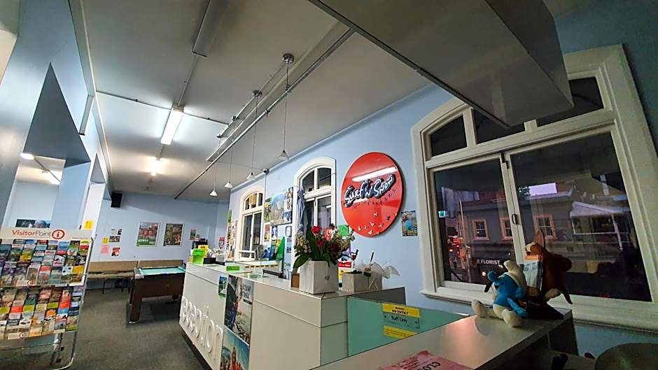 Surf 'N' Snow Backpackers Across Sky Tower