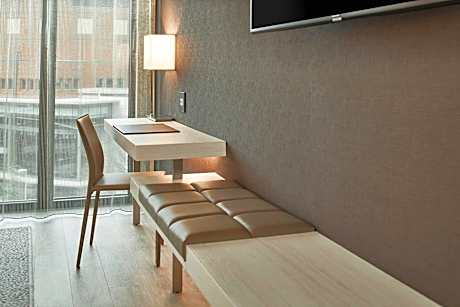 Corner King, Guest room, 1 King, Sofa bed, Downtown view, Corner room, Away from elevator