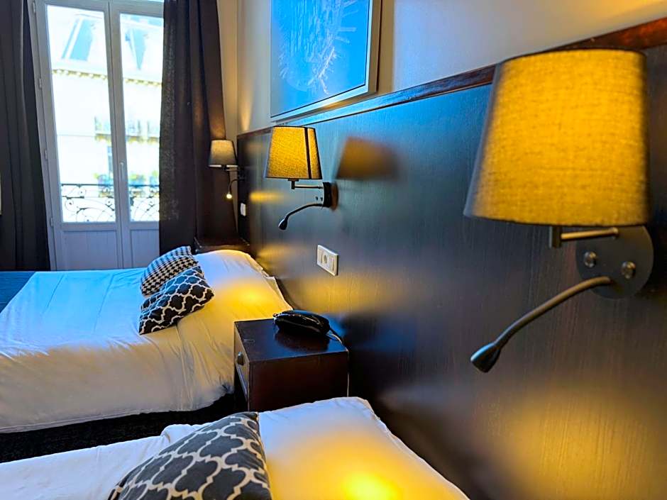 Photo 1 sur 4 de Triple Room