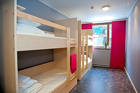 Bed in dormitory female room