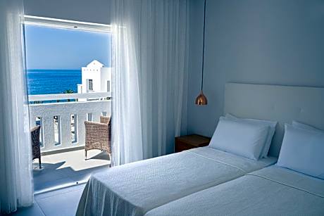 Quadruple Room with Sea View ( 2 Adults & 2 Children)