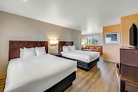 Efficiency Quadruple Room with Two Queen Beds and Sofa bed - Non Smoking