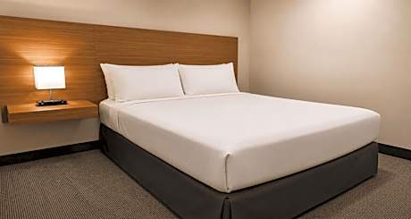 Two-Bedroom Family Suite with Three Queen Beds and Kitchenette - Non-Smoking
