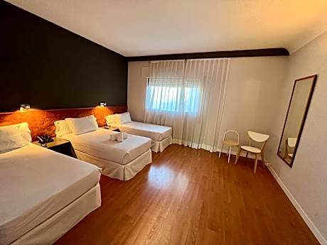 Triple Room - Single Beds