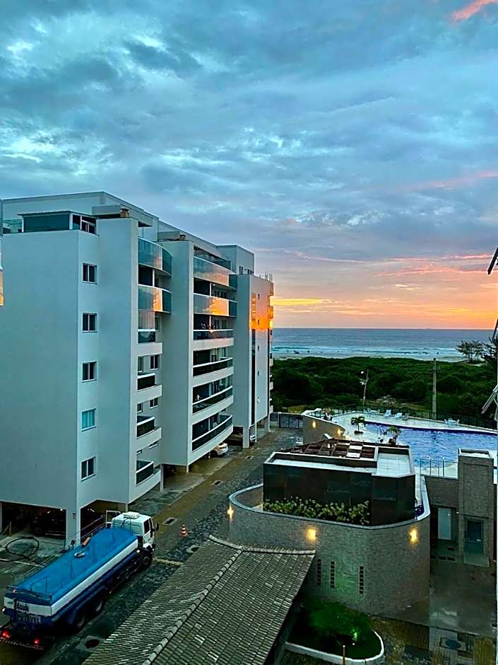 Apartamento aconchegante vista mar e piscina em cond de Arraial do Cabo