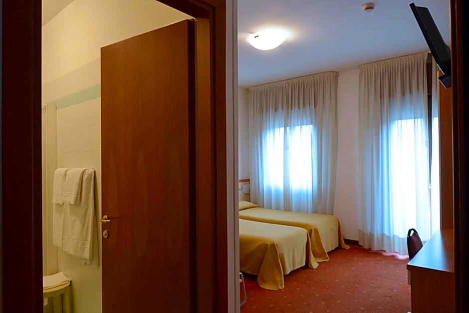 Photo 1 of 6 of Economy Triple Room