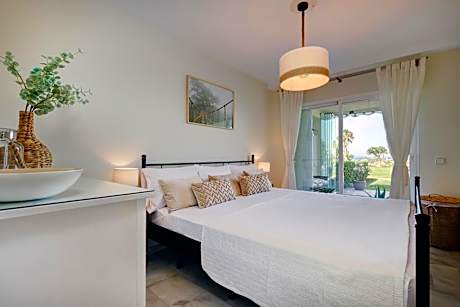 La Cala gorgeous 2 bedroom apartment with stunning gardens, pools and sea views