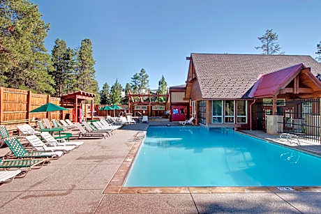 2nd-floor ski-in/out condo with hot tubs, pool, fireplace, grills, & gym