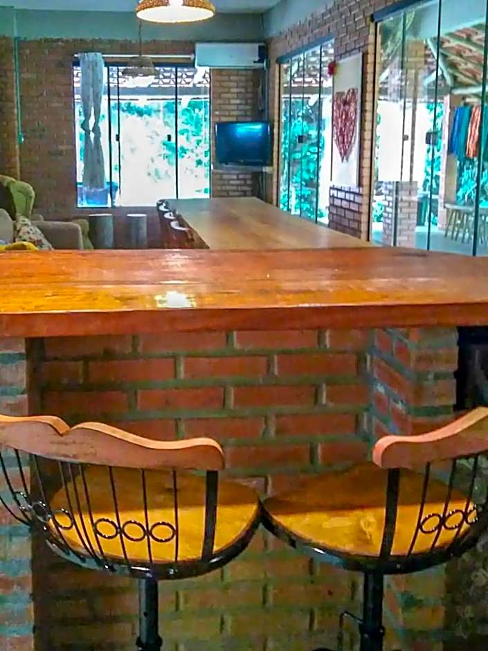 Suíte com Mezanino e Cachoeira no Quintal