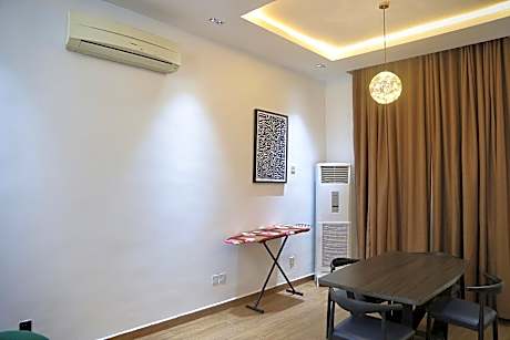 One-Bedroom Apartment with Balcony and City View