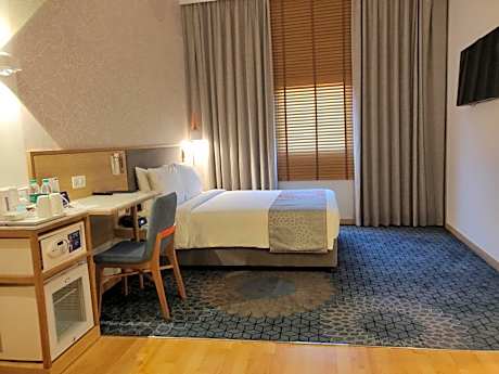 Queen Room - Accessible with Complimentary Early Check-in from 1:00 pm and  Late Check-out by 2:00 pm (subject to availability), 10% discount on laundry services,Enjoy Non Alcoholic Welcome Drink : Choice of one aerated beverage/ tea/ coffee