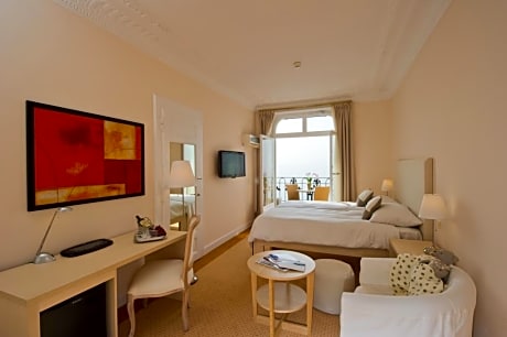 Deluxe Room high floor with a balcony and lake view