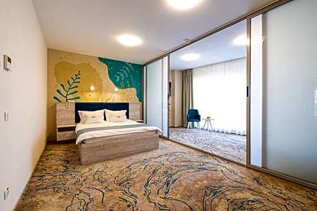 Grand Deluxe Room with sofa and spa access