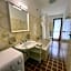 San Luigi - Rooms & Apartments