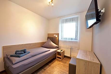 Single Room with Shared Shower and Toilet