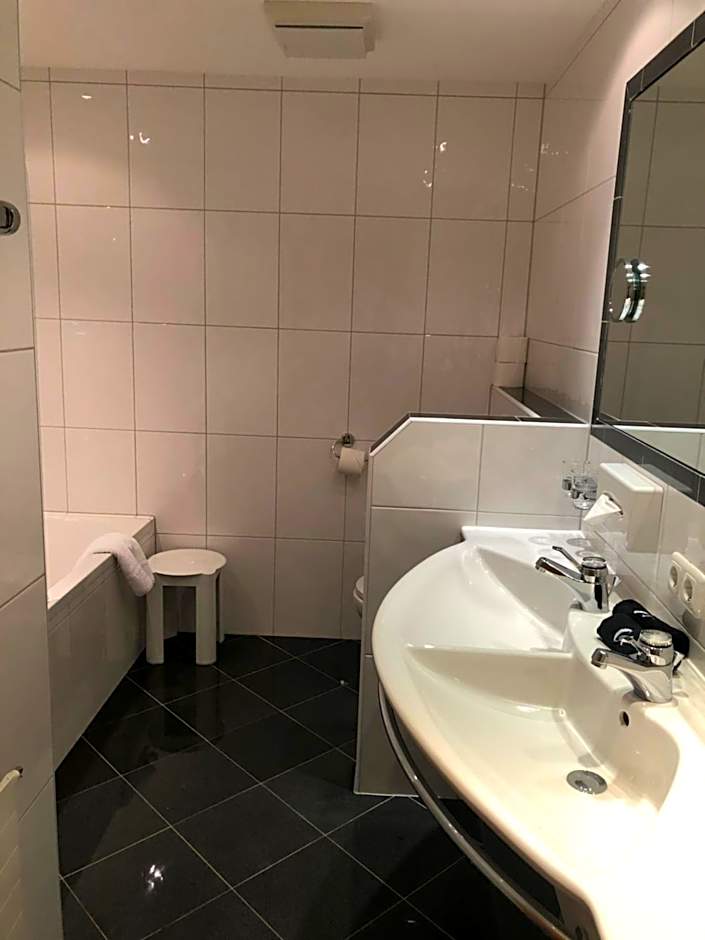 Hotel Garni Central - Zimmer - Studios - Apartments