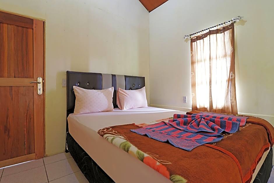 Tuk Tuk Timbul Bungalows