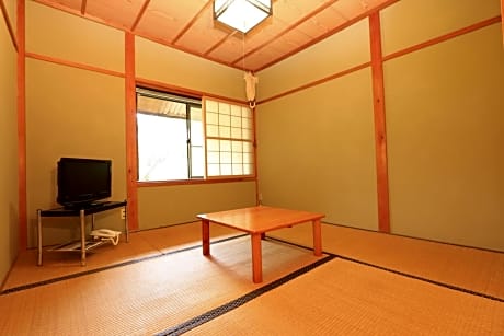 Japanese-Style Family Room with Shared Bathroom