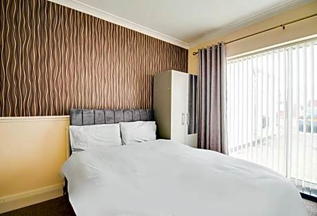 Quadruple Room with Shared Bathroom