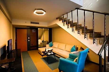 Duplex Suite with 1 Queen Size Bed and Sofa