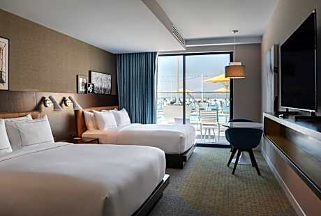 Queen Room with Two Queen Beds and Poolside Patio