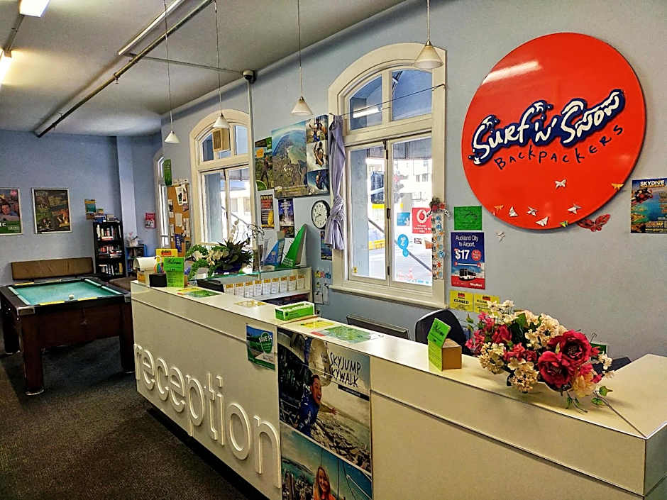 Surf 'N' Snow Backpackers Across Sky Tower