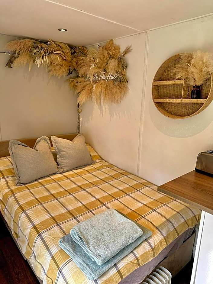 Apple tree hut, in a private garden