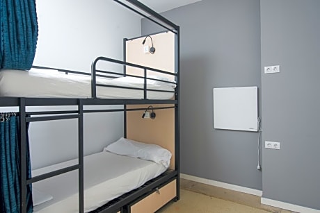 Bed in 4-Bed Female Dormitory Room with Shared Bathroom