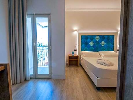 Deluxe Room with Queen Bed and Sofa Bed