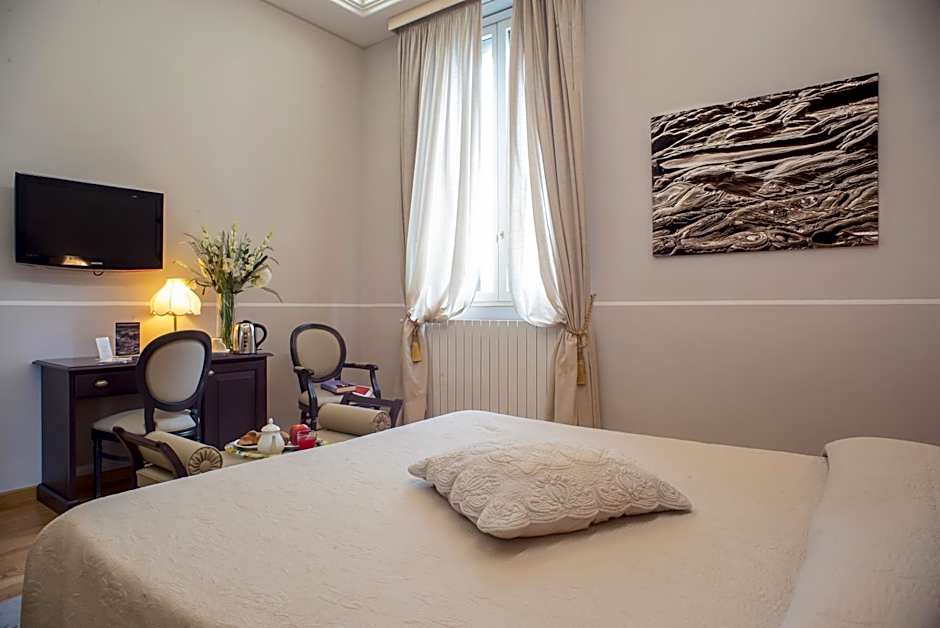 Photo 1 of 21 of Triple Room
