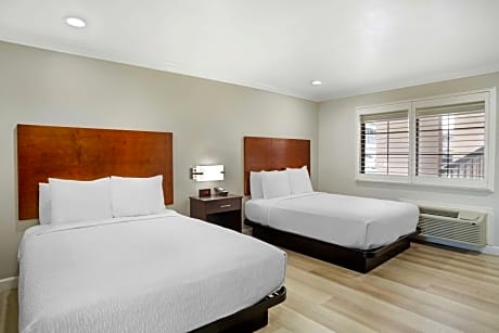 Queen Room with Two Queen Beds and Mobility Accessible Roll-In Shower