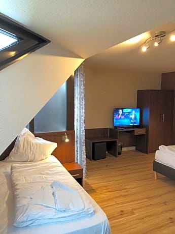 Quadruple Room with Shared Shower and Toilet
