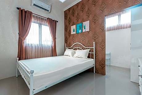 OYO Life 2658 Kost Rasyamada