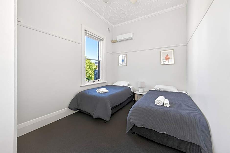 Photo 1 of 8 of Twin Room with Shared Bathroom