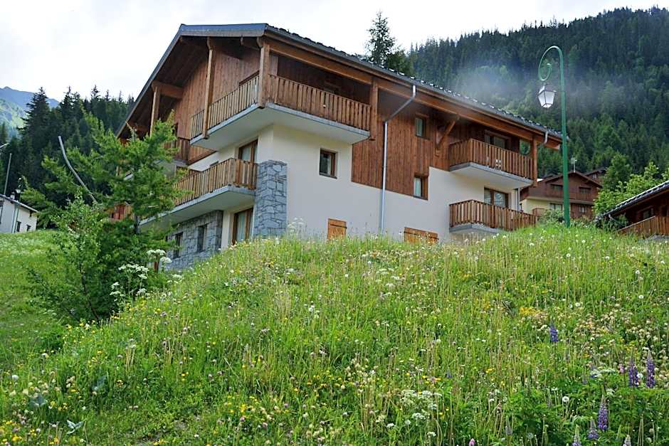 Vacancéole - Résidence Les Chalets de la Ramoure