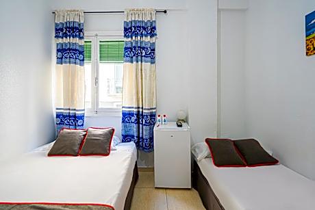 Triple Room with Shared Bathroom