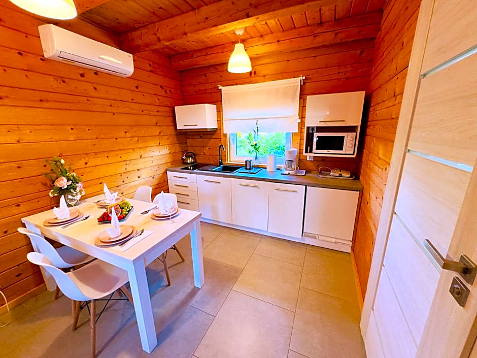 Biale Domki Paula Rewal - Domki z klimatyzacja, w obiekcie Jacuzzi i darmowe Wifi!