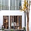 White Wall Riverfront Hotel