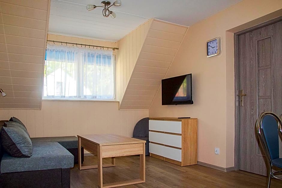 Sztil - Apartamenty i drewniane domki