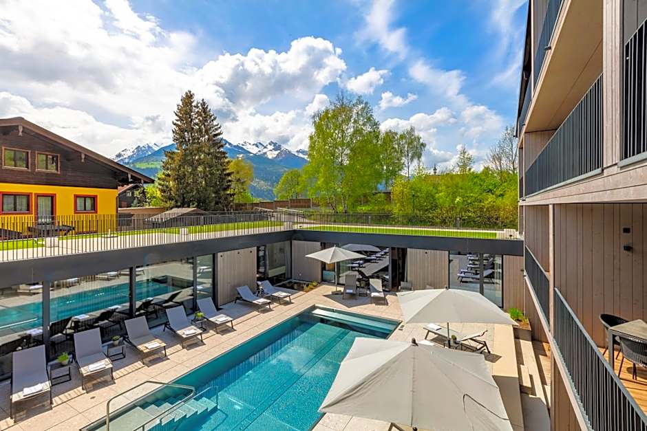 Emma Deluxe Aparthotel, Aircondition, ganzjährig beheizter Außenpool & Skibus direkt vor der Tür