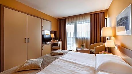 Standard double room with view and balcony