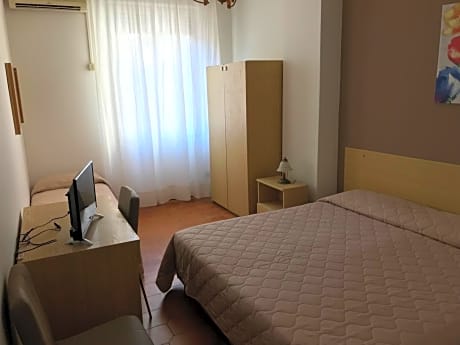 Economy Triple Room with Interior Patio View