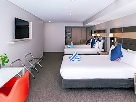 Superior Family Room with One Queen Bed, Two Single Beds and Bath