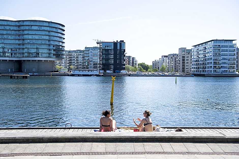 By The Pier Apartments Into This Place