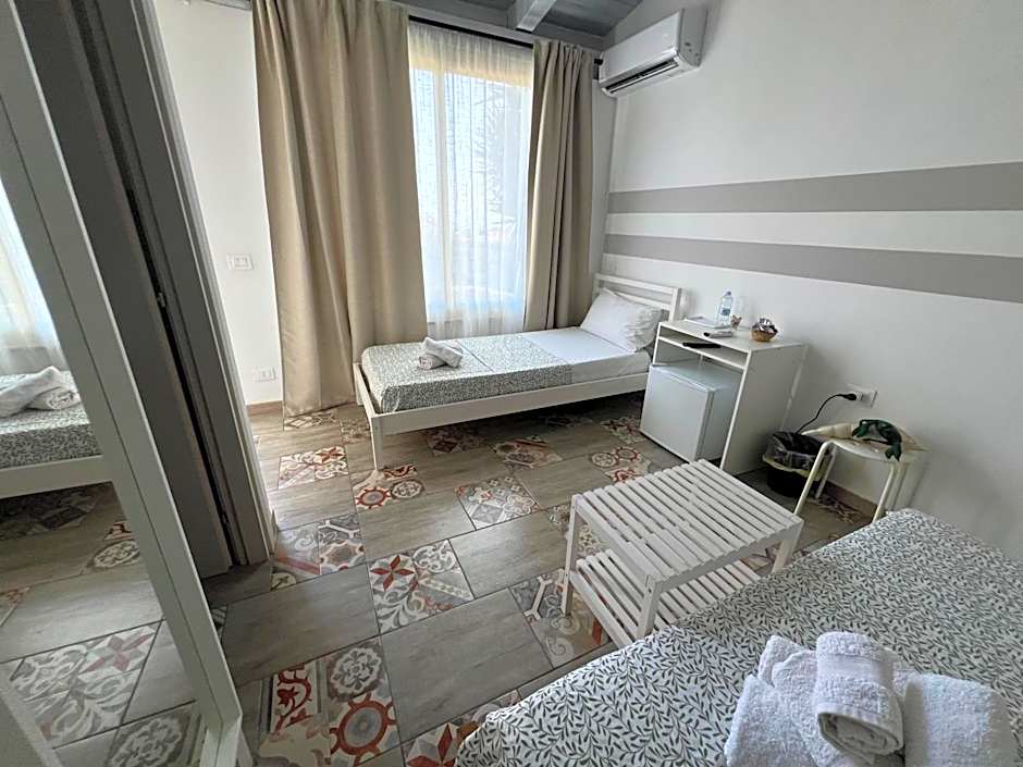 Photo 1 of 13 of Triple Room with Bathroom